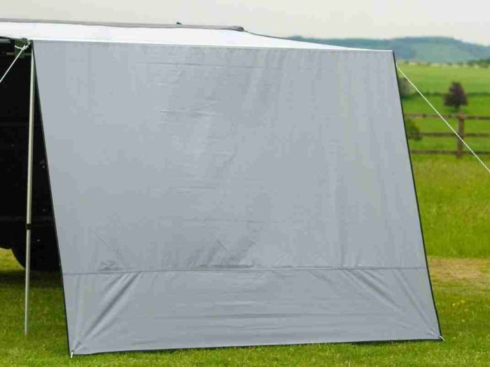 Front wall for a vehicle side awing 2.5m on a Land Rover in a grassy UK field.