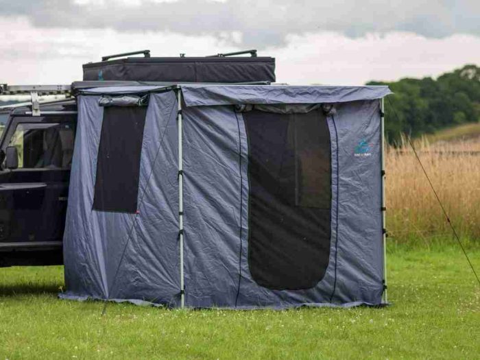 2m x 2.5m Awning room under a side awning on a Land Rover in a field.