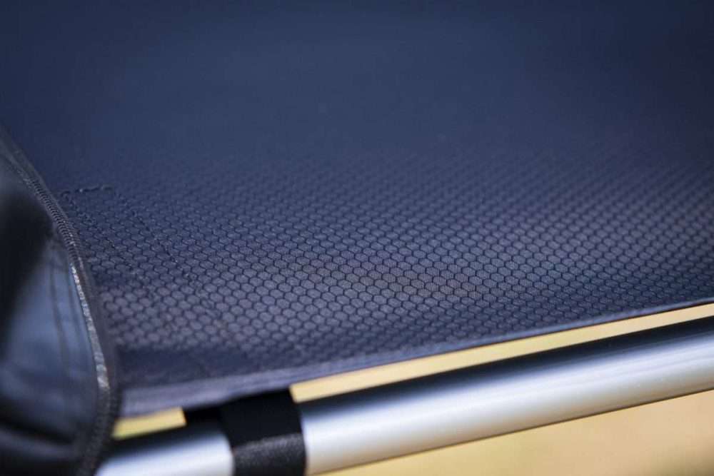 A closeup view of the honeycomb ripstop canvas used in a car awning.